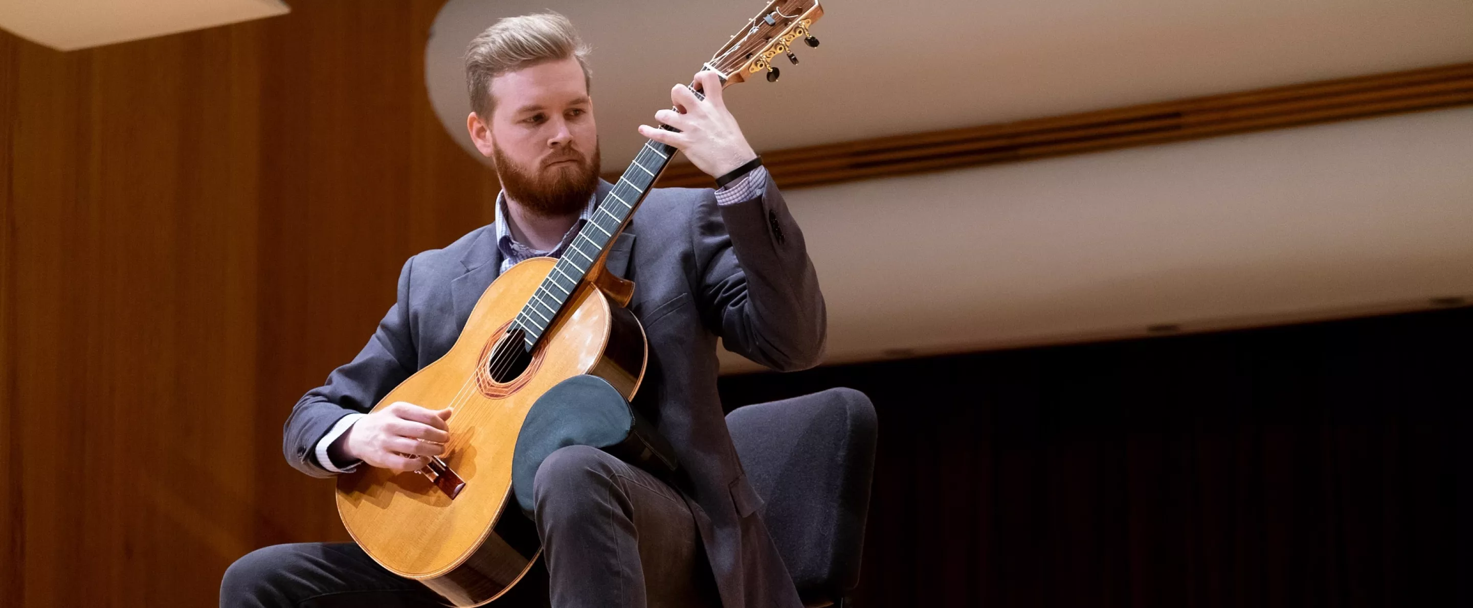 Man plays guitar