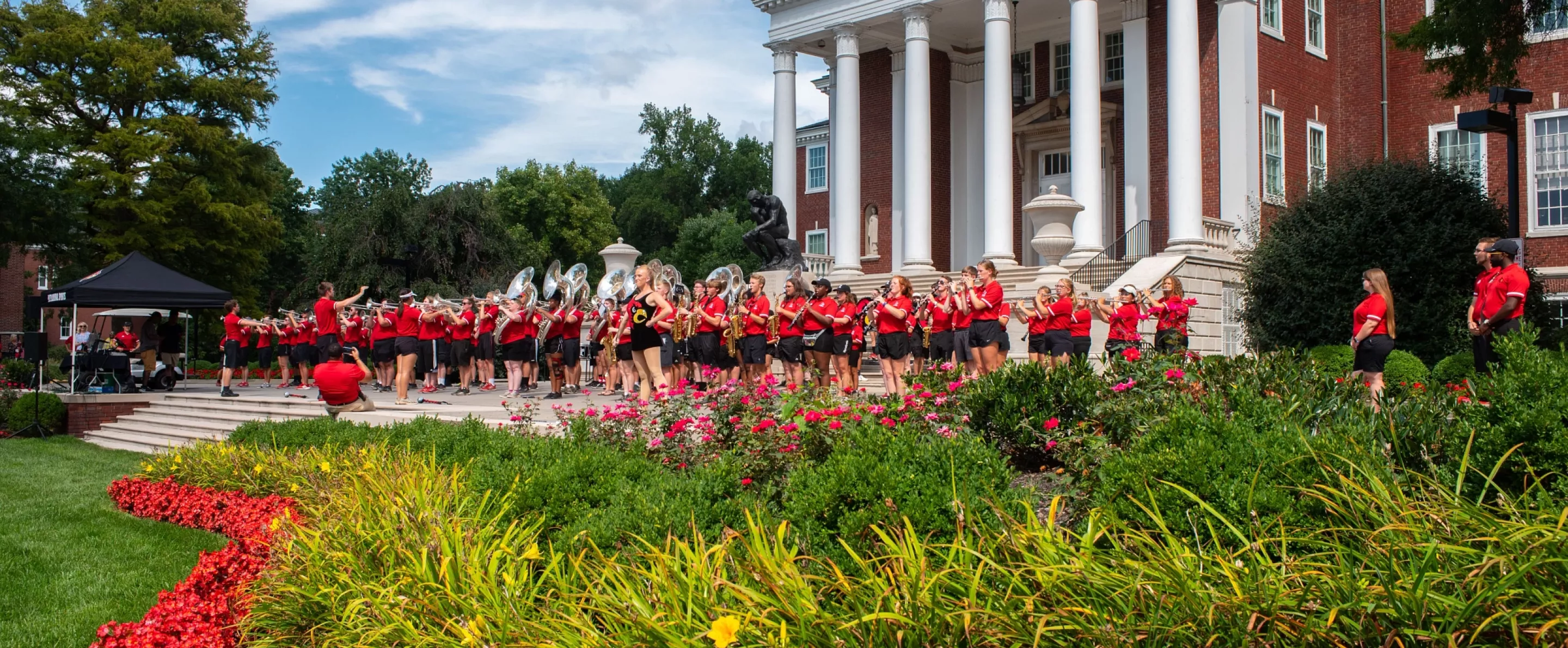 Marching band plays during welcome week picnic at the oval in front of Grawemeyer Hall.