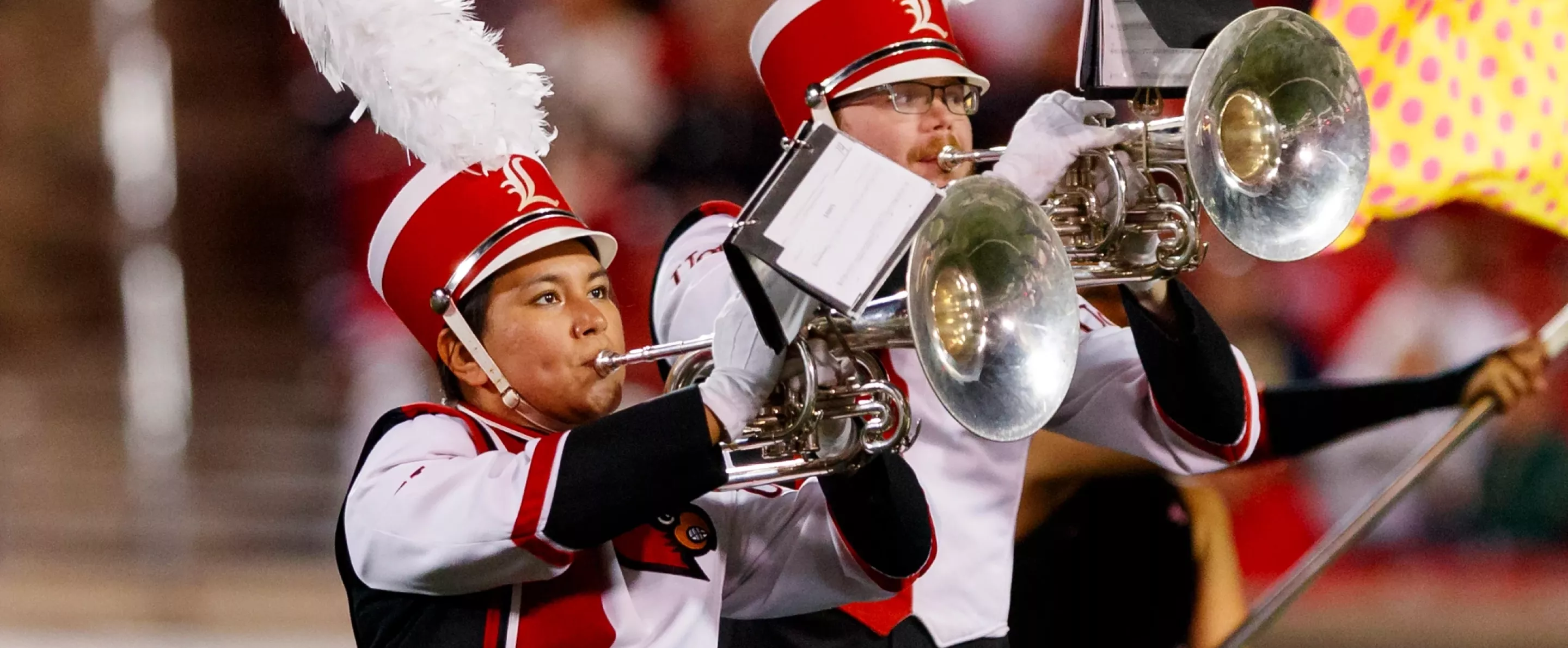 Marching Band playing trumpets at halftime at the UofL vs Notre Dame football game