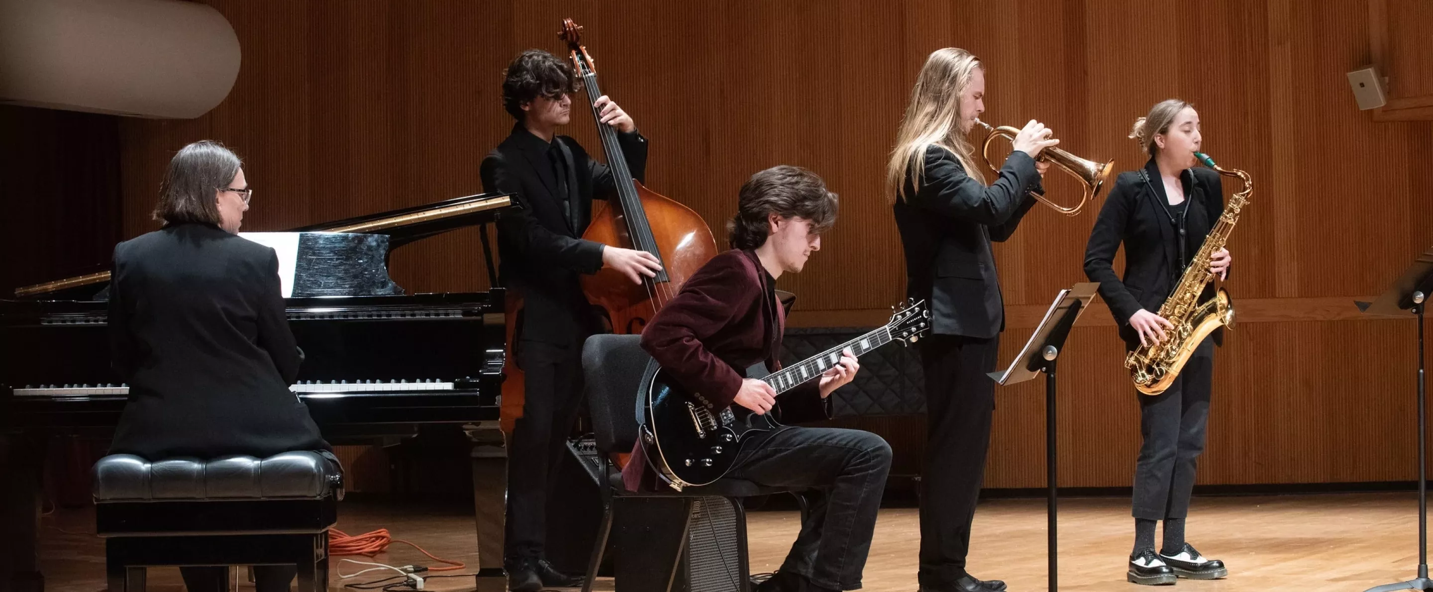 Five students in a jazz band