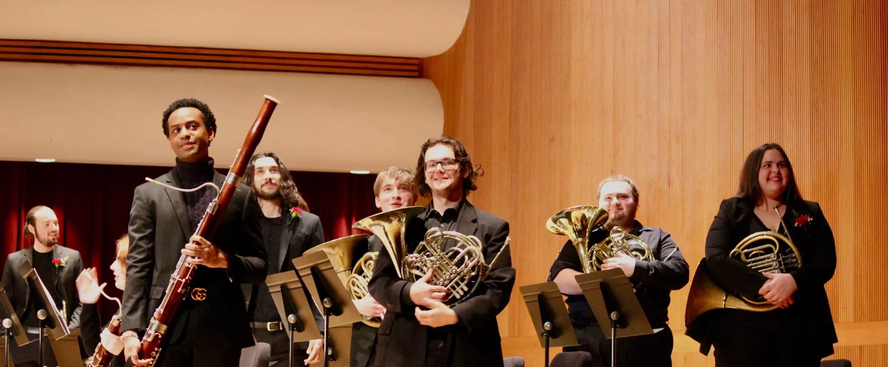 Students standing after wind band concert
