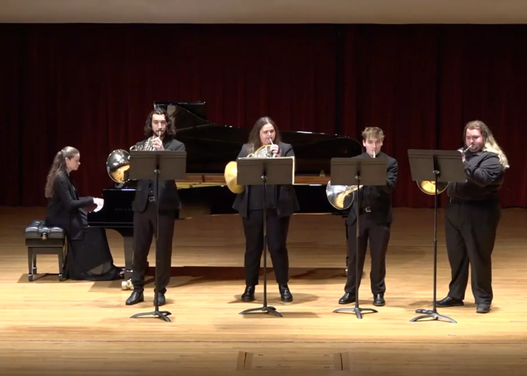 Horn Studio students performing with pianist on stage