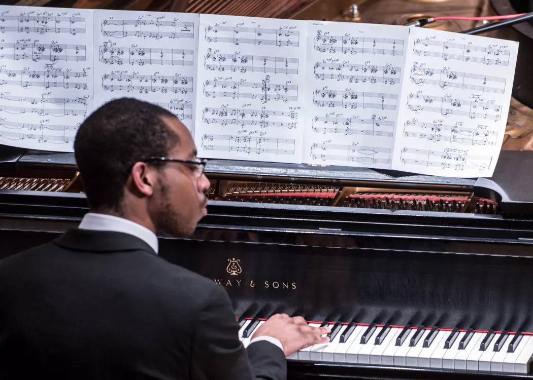 Music student playing the piano