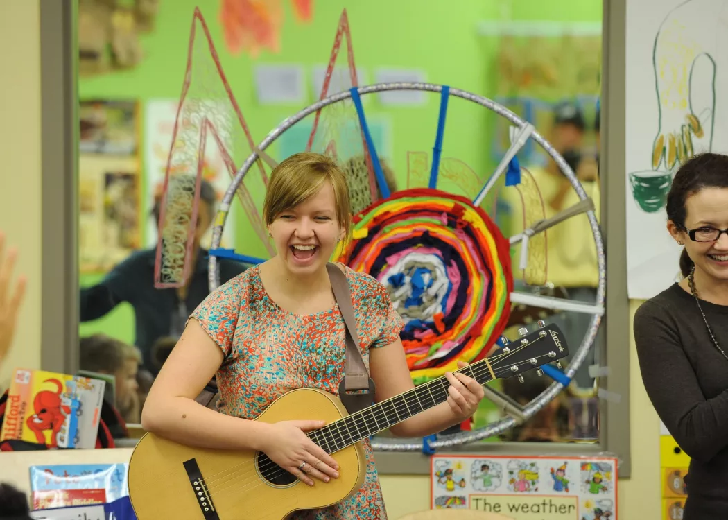 Music Therapy Clinic student playing guitar