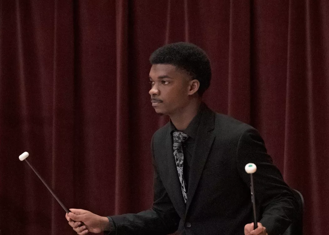 Percussion student during Wind Ensemble performance