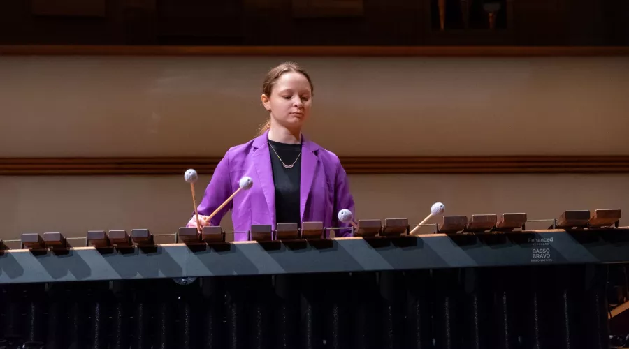 Student playing percussion